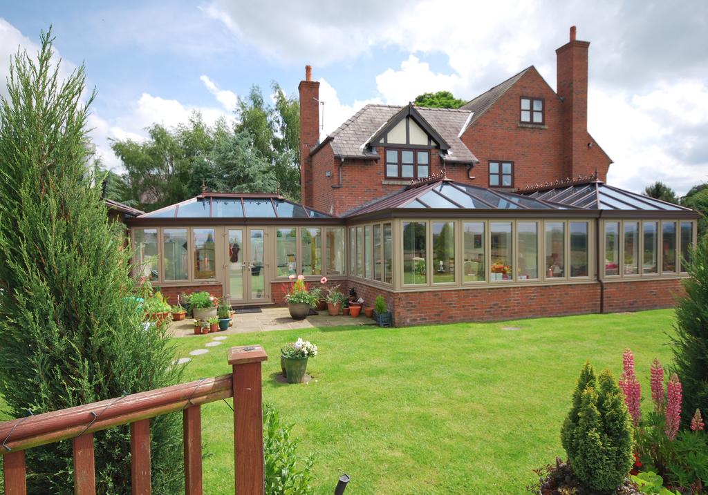 Timber orangeries tend to be painted which gives a stunning hand-finished look.