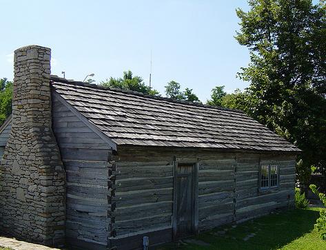 upon the history and technology of log cabin building beginning in Northern Europe.