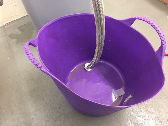 Verify the water supply flow by running it into a bucket to confirm the correct flow 5.