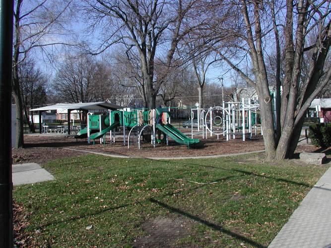 Two tennis courts received a carpeted playing surface in 1992. Playground last renovated in 2002, offers two age group areas. Park Benches are dated and poorly located.