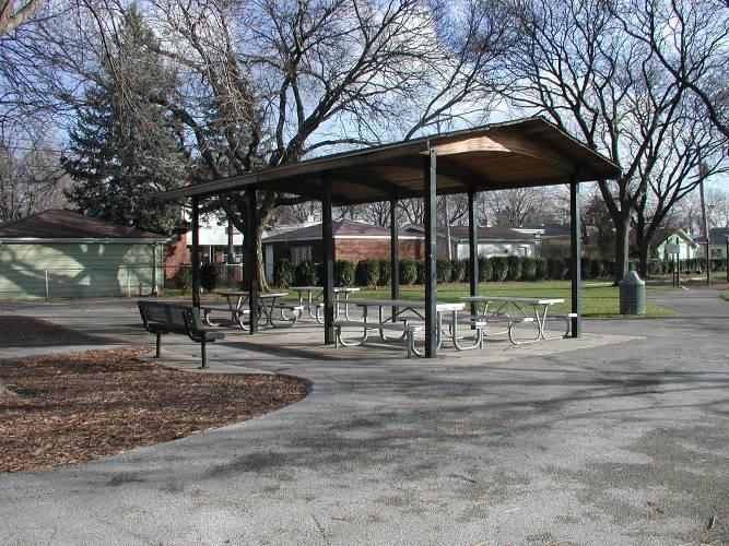 Homes are separated from the park with landscaping and a four foot chain link fence. Head-in parking is provided on the north end of the park. Park patrons have also utilized the St.