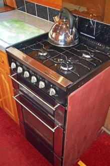 Appliances: Thetford slot in gas cooker with separate oven and grill. 12v, Lec fridge/freezer.