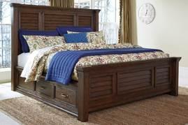 B662 Windville (Ashley Millennium HS Exclusive) Traditional bedroom made with hardwood solids and Mango veneers Panel bed has optional rails with one side drawer storage Rolled