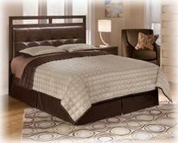 for optimal bedding height Beds available: Full Panel HB (57/B100-21) B165 Aleydis Clean, modern look with large scale pieces in warm brown finish Wide moldings frame the case pieces, beds, and