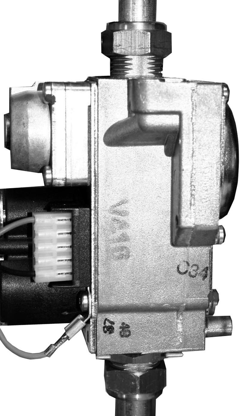 5 GAS CONTROL VALVE REPLACEMENT SERVICING 1. Refer to Frame 45. 2. Unplug the electrical lead connection from the gas control valve and disconnect the earth wire.