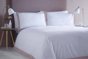 MADISON Crisp white bedding with a plain dyed border to the duvet cover and