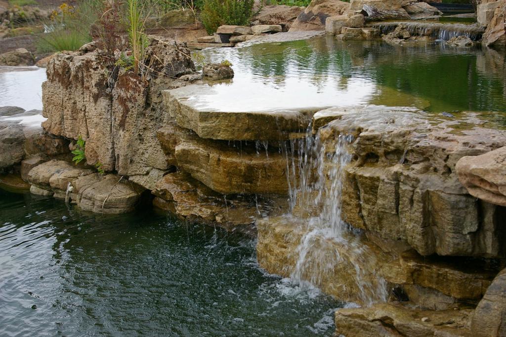 Page 13 Alternative Design Element: Circulating Boulder Waterfall Pond Outfall.