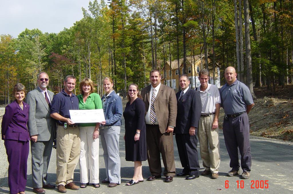 On October 6, 2005, The Tioga County Water Quality Coordinating Committee presented a check for $1000 to Dan Myers, developer of Terrace in the Woods subdivision, for his foresight in utilizing Low