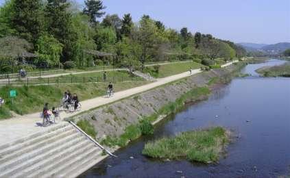 This type of embankment can be termed as Urban Riparian Embankment, owing to the surrounding urban context. The illustrations, Figure 4.31 here demonstrate a moderately developed area along the river.