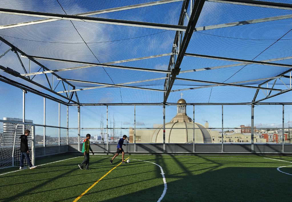The rooftop sport court overlooks the city, and provides