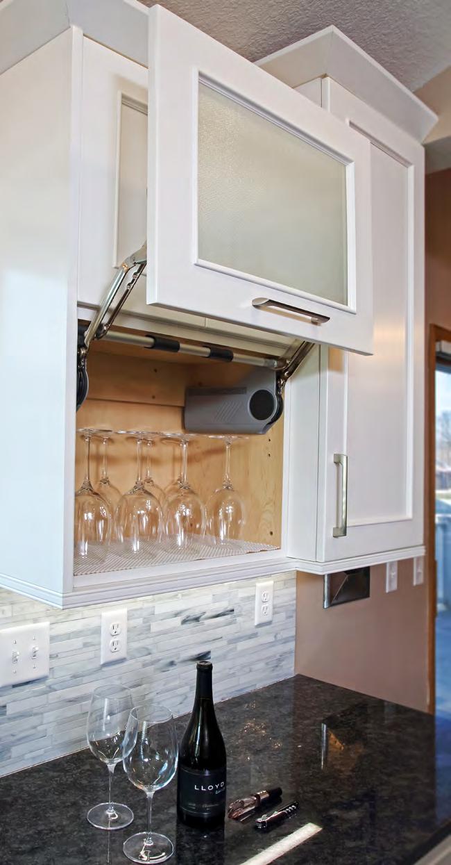 sink and disposer, and a wine fridge and rack.