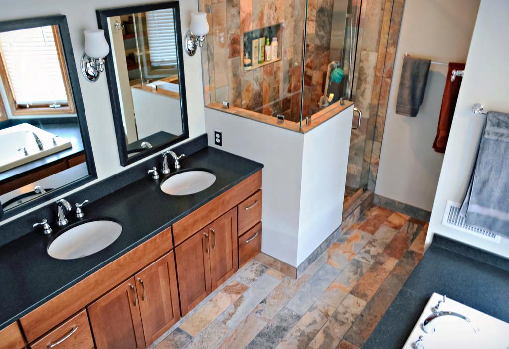 MASTER BATH MAKEOVER This bold master bath remodeling blends old with modern for a whole new look.