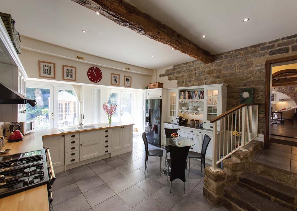 Kitchen 21 4 x 16 4 (6.5m x 5.0m) From the entrance hall stone steps with oak hand rail and wrought iron balustrade lead down to this fabulous hand made kitchen.