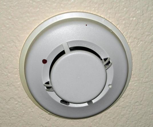 As required by code for new construction, wired smoke alarms have two advantages.