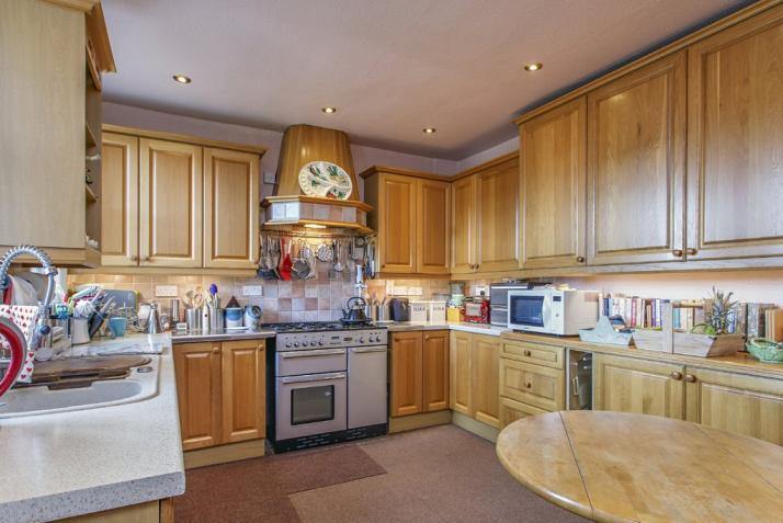 The property offers spacious flexible accommodation with three reception rooms, five bedrooms, one of which is a master with dressing room and en suite, and views out to sea from the top floor.