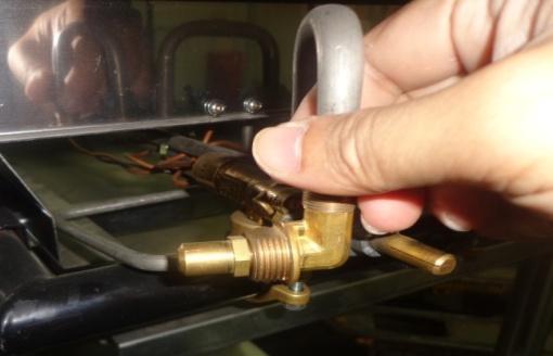Clean the injector or replace the injector if necessary. Follow the main burner injector removal procedure. Main burner low flame setting is too small or too low. Main burner flame color is yellow.