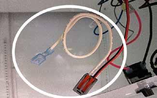 12 Attach provided white wire with spade connector (item F from parts kit) onto the neutral terminal on the