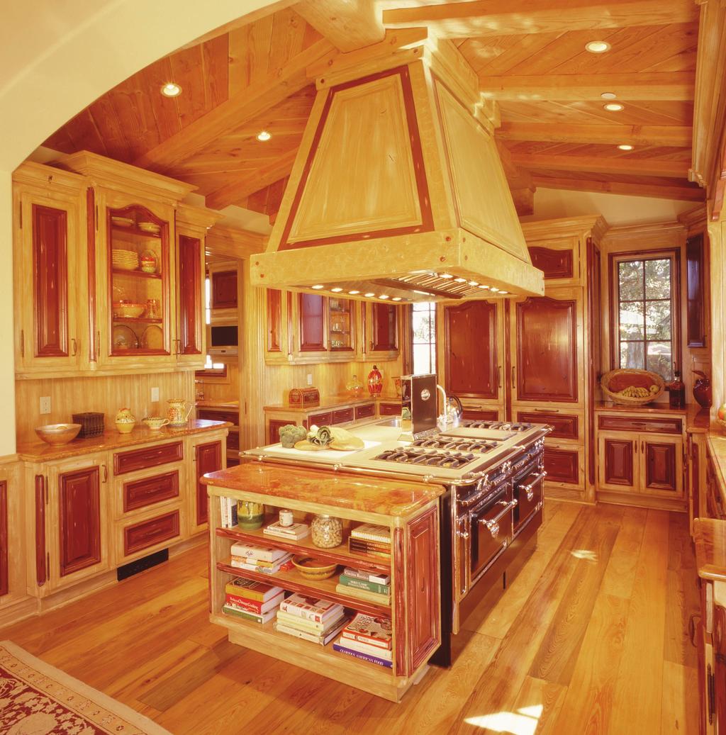 The beautiful Country French kitchen was designed and built by Julian Sahagun.