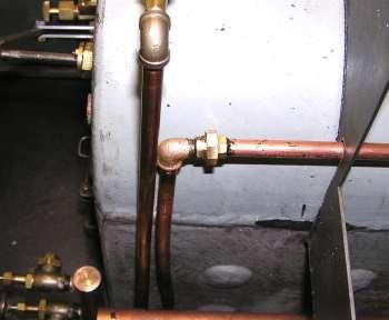 However, there is an advantage in having the pipes enter the cab over the curved part of the boiler---- there can be a slot for the pipe in the cab front rather than a hole.