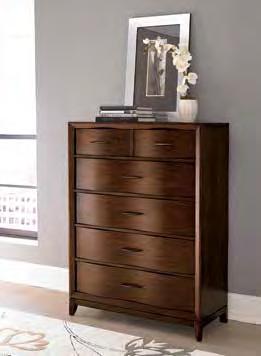 Bent wood drawer-fronts, accented with polished graphite grey hardware, create graceful curves that carry from each case