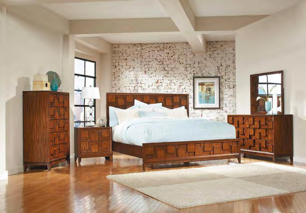 Framing the creamy white upholstered headboard, the oval and diamond pattern also serves to highlight the reversible wood and mirror accents on the top drawer of each case piece.