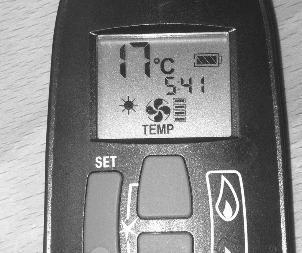 1 In order to change the mode of operation from MANUAL to TEMPERATURE, press the SET button, the fire will then change to either DAY TEMP (figure 49) mode or NIGHT TEMP mode (figure 50).