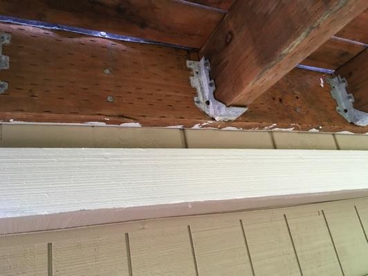 installed. Ledger board secures deck to the house with nails instead of lag bolts.