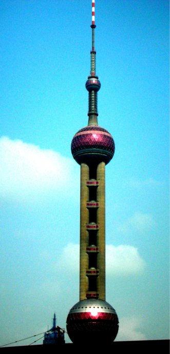 The Pearl TV Tower, like the Opera House in Sydney, Australia, is the icon for the Chinese city of Shanghai.