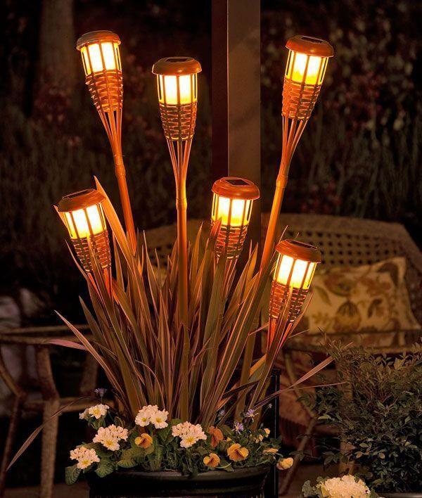 1 TIKI TORCHES AND BARE BULBS Tiki torches are nothing new on the scene, but they