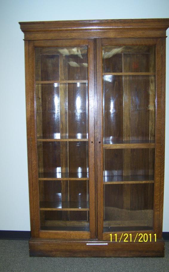 Oak Closed Door Bookcase-17 $1,050.00 Late 19 th or Early 20 th Century. A step down molded cornice with paneled sides.