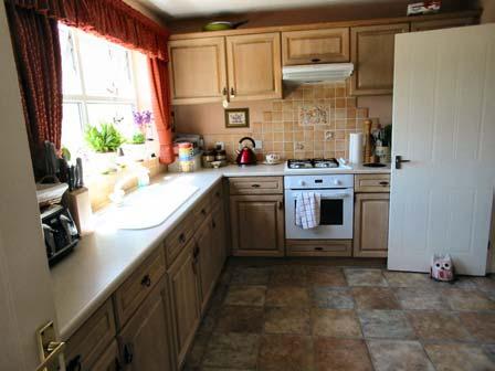 Kitchen: Utility: Downstairs Cloakroom: Music room: 12'3" x 9'2" (3.73m x 2.79m) Inset sink with draining board and mixer tap.