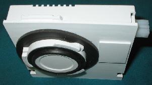 located in the top right rear of tub, this allows the vent fan to draw in outside air resulting in hot air being forced out the bottom of the outer