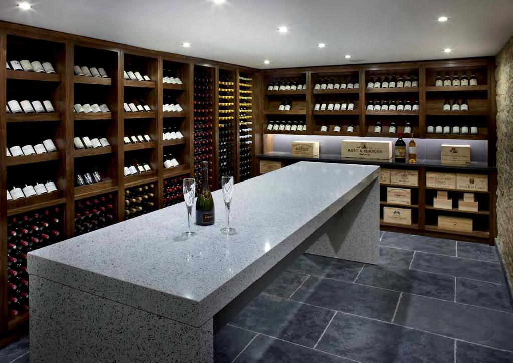 An extensive walnut wine cellar complete with a