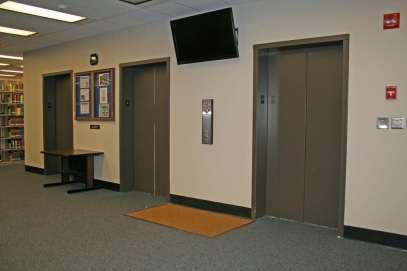 Recommendations Image depicts fourth floor elevators. Mat was placed between the two elevator doors. Placing mats in front of the doors would help indicate the location of the elevator opening.