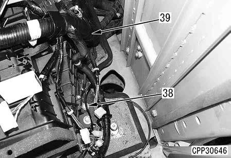 a Separate the pump controller assembly and main wiring harness from the floor frame and move