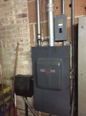 The main switchboard back feeds the original building service entrance in the old high school portion of the facility.