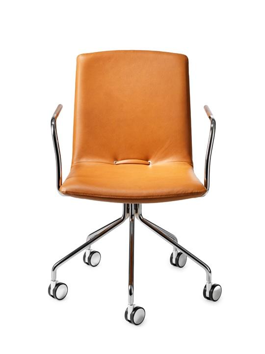 Day III Swivel Chair by Pierre Sindre Day is an upholstered