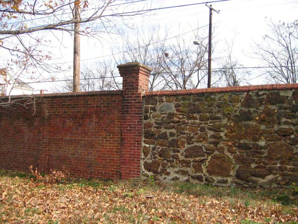 Figure VI.8: The intersection of brick and stone construction along the frontage of the West Campus.