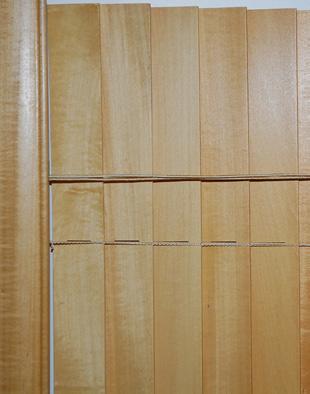 Each slat features the richness and warmth of genuine wood in three finishes. Locking pull cord adjusts blind height.