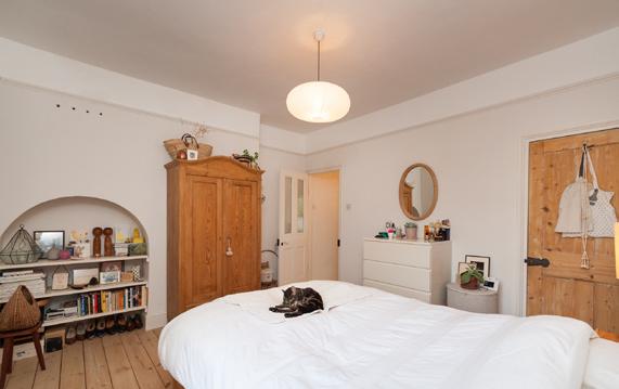 Retreat... Upstairs are the generous airy bedrooms with light floorboards, and delightful original features, along with an inviting ensuit bathroom with role top bath.