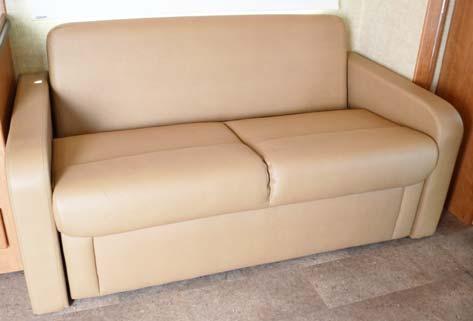 Remove sofa seat back, set aside. Pull sofa back cushion OUT and DOWN.