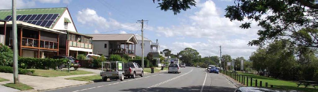 21 Tumbulgum: Riverside Drive with wide footpaths, speed limit reduced to 40 km/h.