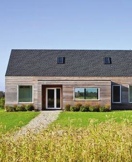 getaway. All too aware of the exorbitant cost of heating a home in New England, they were easily persuaded by architect Stephanie Horowitz to build a passive house one heated primarily by the sun.