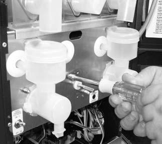 Figure U Figure V Figure W Figure X Replacing Water Tank on Machines with Serial #