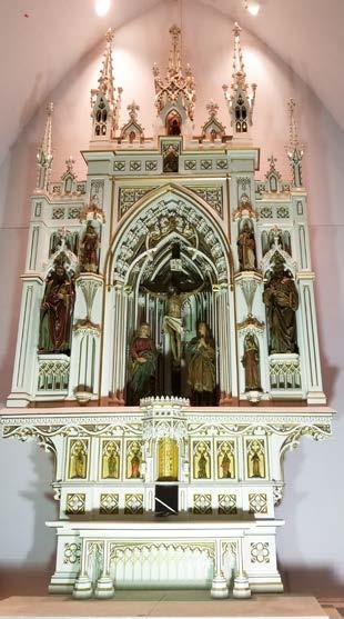 This one-of-a-kind 4-story carved wood altar