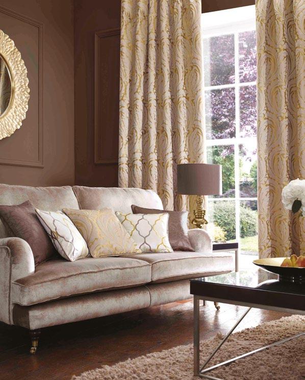 Copper, gold, silver and pewter are used in accessories and soft furnishings against a neutral backdrop.