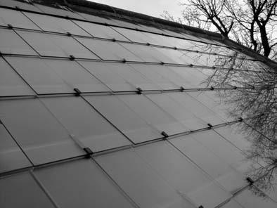 94 Microgeneration for larger buildings Toughened glass solar slates can replace an entire south facingroof (Reproduced with permission from Solex Energy Ltd) Translucent polycarbonate solar tiles