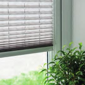them with the blinds in place Fitting the blinds into the window without