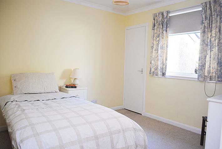 Additional benefit is the double built in wardrobes with hanging rails, shelving and drawers, ceiling light,fitted carpet, central heating radiator, T.V. aerial point, telephone point.