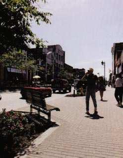 associations. An effective means of unifying the streetscape is the use of interlocking concrete pavement in sidewalks, crosswalks, parking areas, and roads. NORTH BAY, ONTARIO, paved 150,000 s.f. (15,000 m 2 ) in 1983 as part of a complete streetscape revitalization program.